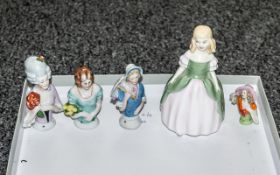 Small Collection of Lady Figurines.