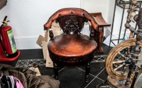 Antique American Captains Chair with a central carved back splat, supported by horseshoe shaped