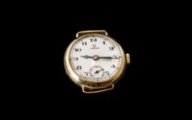 9ct Gold Omega Wristwatch white enamelled dial, Arabic numerals with subsidiary seconds 27 mm case,
