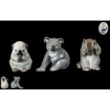 Bing and Grondahl Three Towers and Royal Copenhagen Trio of Hand Painted Porcelain Animal Figures.