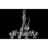 Glass Wine Decanter together with six glasses with handles and footed base.
