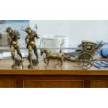 Two Matching Brass Figures, 14" tall, depicting youths carrying baskets of grapes on their backs,