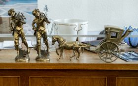 Two Matching Brass Figures, 14" tall, depicting youths carrying baskets of grapes on their backs,