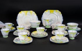 Art Deco Porcelain Tea Set, a fine quality painted set with floral decorations consisting of 8