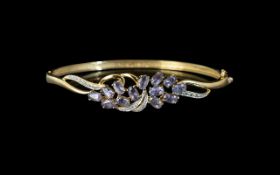 9ct Gold Gem Set Hinged Bangle, The Front Set With Round Cut Diamonds And Pale Amethysts,