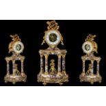 A French Marble And Gilt Bronze Mantle Clock in the Louis XV1th Style,