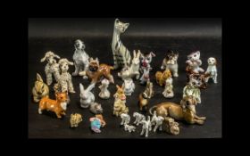 A Collection of Decorative Animal Figures Includes 17 x Various China / Porcelain Dogs, 1 x Cat, 1 x