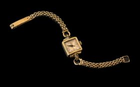 Ladies 9ct Gold Omega Wristwatch square silvered dial,