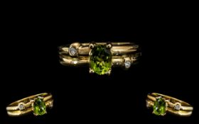 18ct Gold Attractive Ladies Peridot and Diamond Dress Ring. Stamped 750 - 18ct to Interior of Shank.