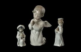 Lladro Angel, kneeling figure 5" tall, together with two small Lladro Nativity figures,