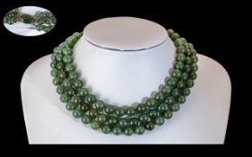 1920's Malachite Well Matched Triple Strand Beaded Necklace with silver clasp stone set.