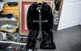Ladies Black Mink & Leather Full Length Coat, with leather placket, waistband and cuffs.