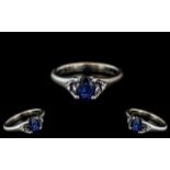 18ct White Gold - Attractive Contemporary Sapphire and Diamond Set Dress Ring.