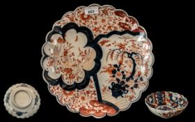 Japanese Imari Charger, with scalloped edge, iron red floral decoration,