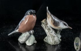 Bing and Grondahl Three Towers Pair of Hand Painted Porcelain Bird Figures.