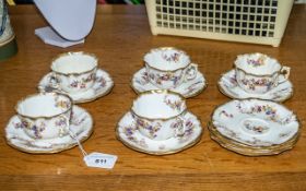 Osler Calcutta Set comprising five teacups and eight saucers, with decorative pattern.