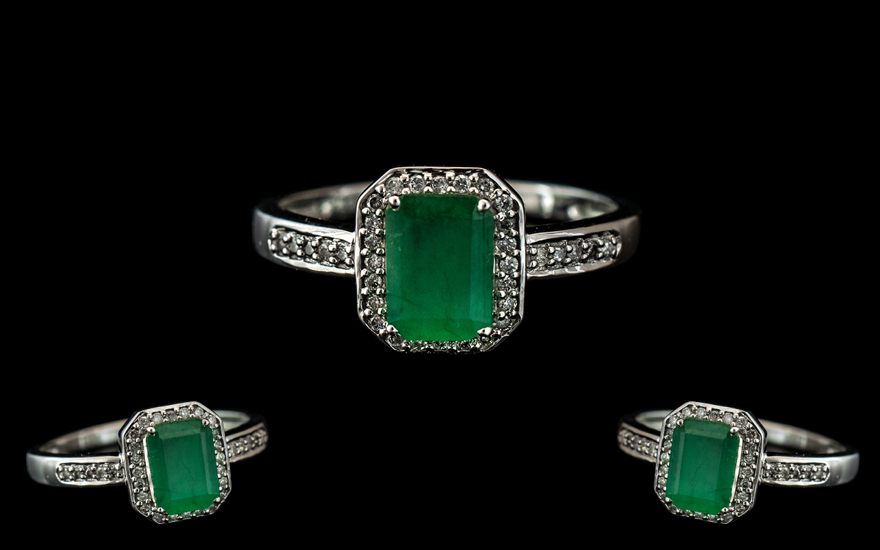 Ladies 10ct White Gold - Attractive Diamond and Emerald Set Dress Ring of Pleasing Design.