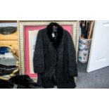 Beautiful Black Astrakhan Coat, with black mink collar, made by Raimond Furs of Manchester.