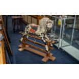 Antique Rocking Horse. Rocking Horse In Dapple Colour, Signs of Wear Due to Age. 40 Inches High.