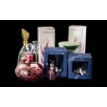 Quantity of Quality Glass, comprising three matching lidded perfume bottles,