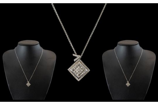 18ct Gold Diamond Set Pendant of square design set with princess cut diamonds. Est diamond weight
