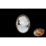 Large Shell Cameo Depicting A Maiden Facing Left, Mounted In A 9ct Gold Frame With Rope Twist Edge.