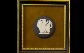 Wedgwood Small Wall Plaque on gold velvet background.