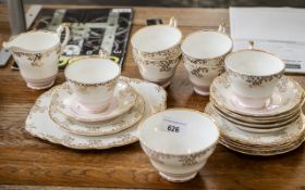 Regency Bone China Tea Set, comprising six cups, saucers and side plates, a milk jug,