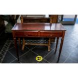 A Modern Mahogany Side Table, with two frieze drawers, raised on square tapering legs.