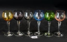 Set of Six Harlequin Hock Glasses, in pink, mauve, green, blue, grey and amber, 7" tall,