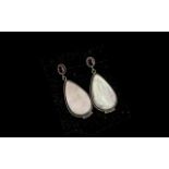 Ruby and Mother of Pearl Drop Earrings, two oval cut rubies,