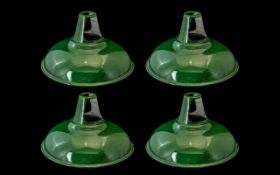 Collection of Four Matching Industrial Style Dark Green Metal Lamp Shades by Coolicon circa 1930's.
