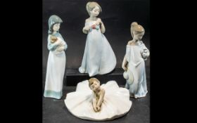 Collection of Nao by Lladro Figures, comprising a seated child ballerina, and three girls,