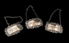 Early 20th Century Silver Decanter Labels. ( 3 ) Silver Decanter Labels and Chains.