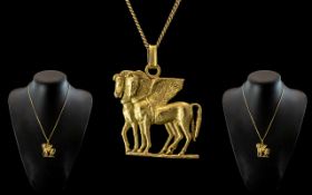 18ct Gold Designer Pendant In The Form Of Pegasus 45 x 37mm Suspended On A 18ct Gold Chain.