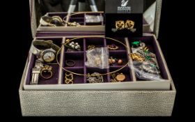 Quantity of Quality Costume Jewellery in a mock snakeskin jewellery box,