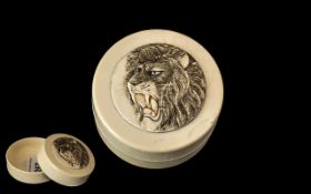 Japanese 19th Century Meiji Period Ivory Lidded Box of Round Form with Carved Raised Image of Lion