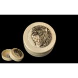 Japanese 19th Century Meiji Period Ivory Lidded Box of Round Form with Carved Raised Image of Lion