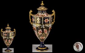 Royal Crown Derby Imari Pattern Twin Handle Urn Shaped Lidded Vase with Embellished Painted Gold