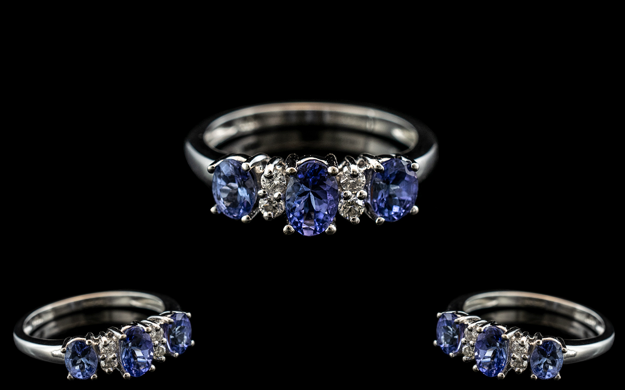 18ct White Gold Attractive Tanzanite and Diamond Set Dress Ring. Full Hallmark for 750 - 18ct to