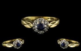 18ct Gold - Attractive and Petite Sapphire and Diamond Set Cluster Ring. Full Hallmark for 18ct.