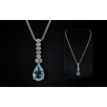 Ladies - Stunning 18ct White Gold Diamond and Blue Topaz Set Pendant Drop. Attached to a 18ct