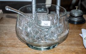 Large Glass Punch Bowl with twelve handled glasses and a large glass serving ladle.