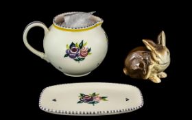Small Collection of Poole Pottery, comprising a Jug decorated with flowers, and a matching oval