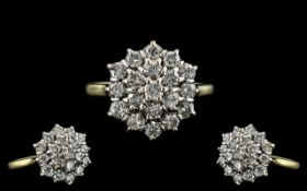 Ladies 18ct Gold - Attractive Diamond Set Cluster Ring. Fully Hallmarked for 750 - 18ct. The Round