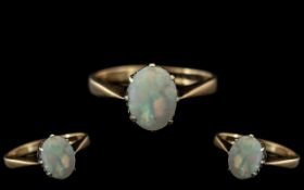 9ct Gold Ladies Dress Ring With Central Oval Opal Measuring 8x6mm, Fully Hallmarked, Gross Weight 1.