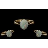 9ct Gold Ladies Dress Ring With Central Oval Opal Measuring 8x6mm, Fully Hallmarked, Gross Weight 1.