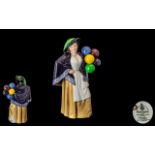 Royal Worcester Hand Painted Ceramic Figure ' Balloon Lady ' HN2935. Designer P.