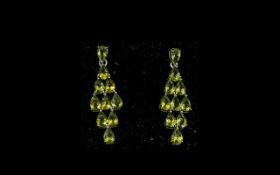 Peridot Five Row Kite Shaped Drop Earrings, of 9cts; each earring with the brilliant,