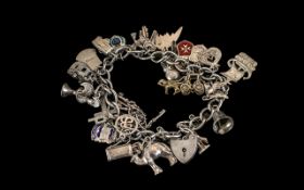 Solid Silver Charm Bracelet Loaded with Charms lovely charm bracelet loaded with interesting charms,